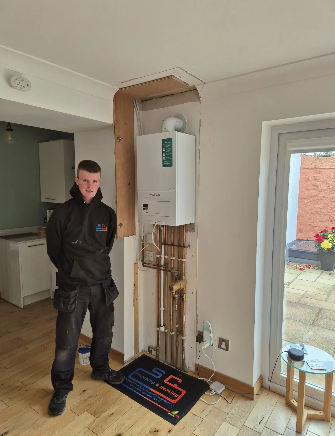 Newly installed wall-hung gas boiler by SC Plumbing and Heating